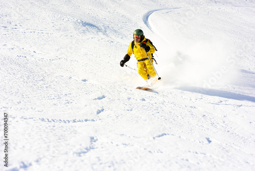 Alpine skier off piste Valley Des Avals Courchevel France photo