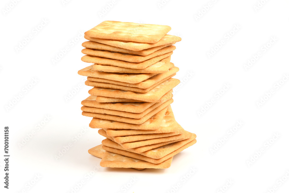 Square shortbread cookies isolated on white background. Stacked butter biscuits for coffee or tee. Square shortbread cookies isolated on white background. Stacked butter biscuits for coffee or tee.