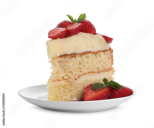 Piece of tasty cake with fresh strawberries and mint isolated on white