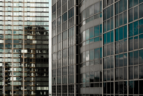 modern architecture glass office building reflection sunny day