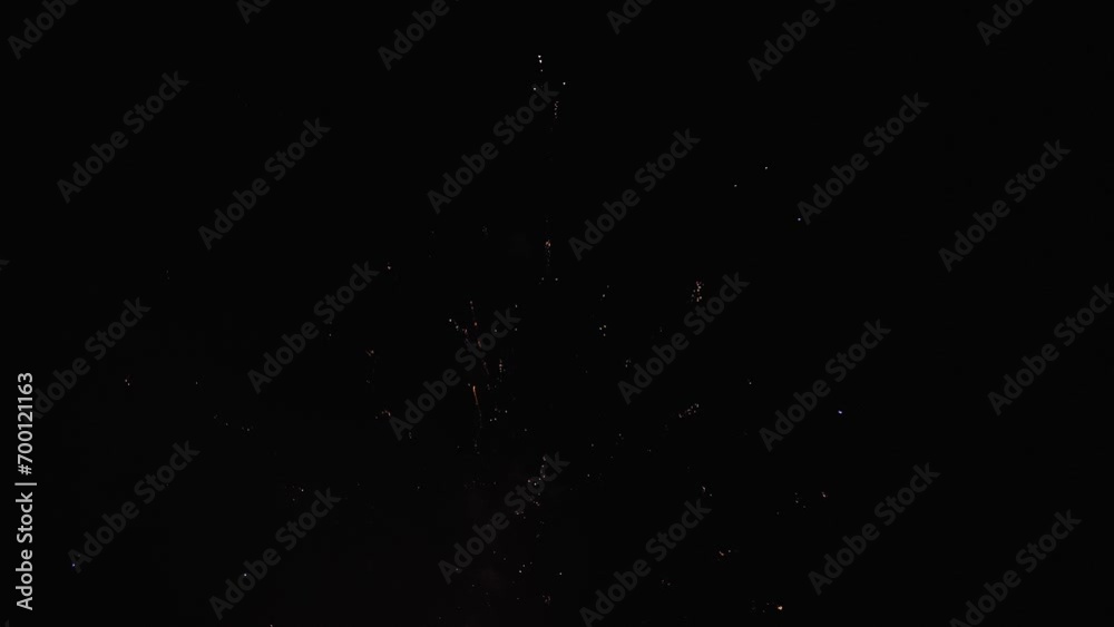 fireworks background, shining fireworks with bokeh lights in the night sky. fireworks background, shining fireworks with bokeh lights in the night sky.