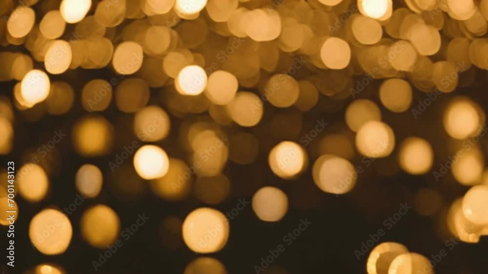 golden bokeh lights in slow motion