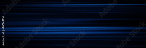 Glowing stripes. Beautiful flashes of light on a dark background. Glowing abstract sparkling background with light effect.