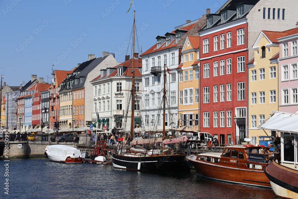 Colourful facade and old ships along the Nyhavn Canal, Copenhagen, Denmark