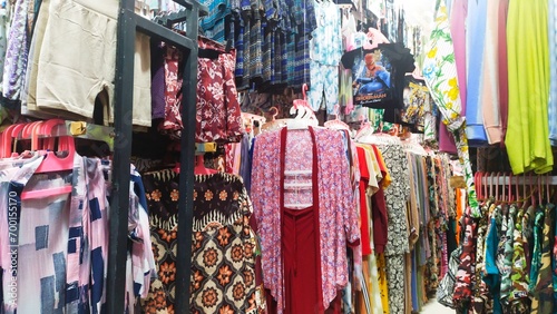 Various models and designs of clothing typical of Pangandaran tourist beach production are displayed for sale © Harris Kharisma