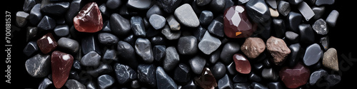 a group of black rocks photo