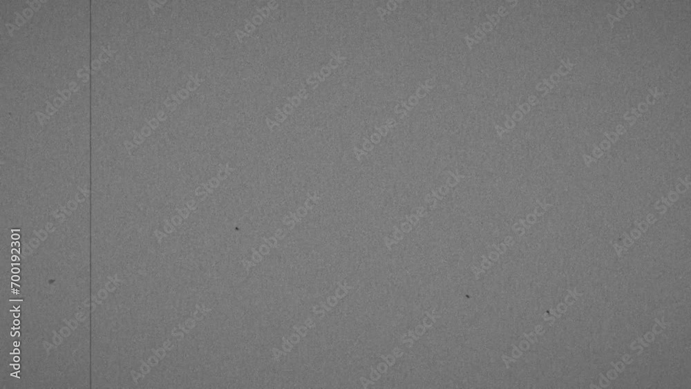 Old film look with scratches, old TV film Look overlay, old film look effect with a dirt, grain texture,vintage realistic flickering. Film grain with light leaks in 4K. Use opacity or screen mode
