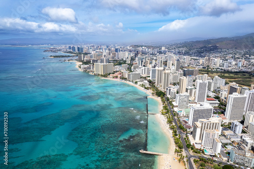 Drone view of man made Waikiki Beach in Honolulu, HI, showing it's wall wave barrier photo