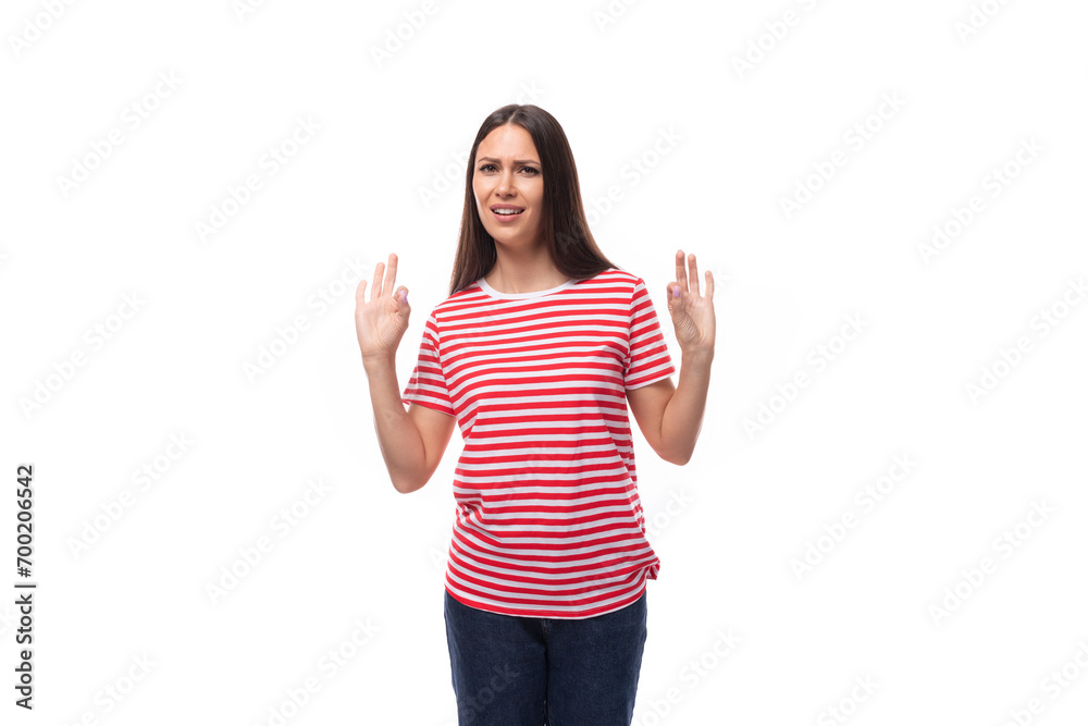 pretty young caucasian promoter woman with straight hair in glasses and in a striped red t-shirt on a white background with copy space pretty young caucasian promoter woman with straight hair in glasses and in a striped red t-shirt on a white background with copy space