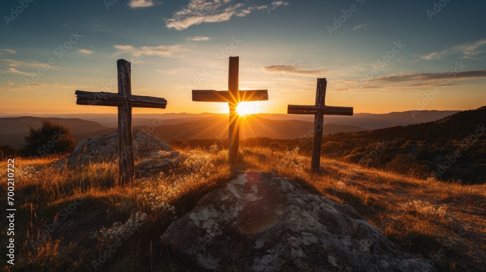 three wooden chrsitian crucifix crosses on hill at sunset - obrazy, fototapety, plakaty 