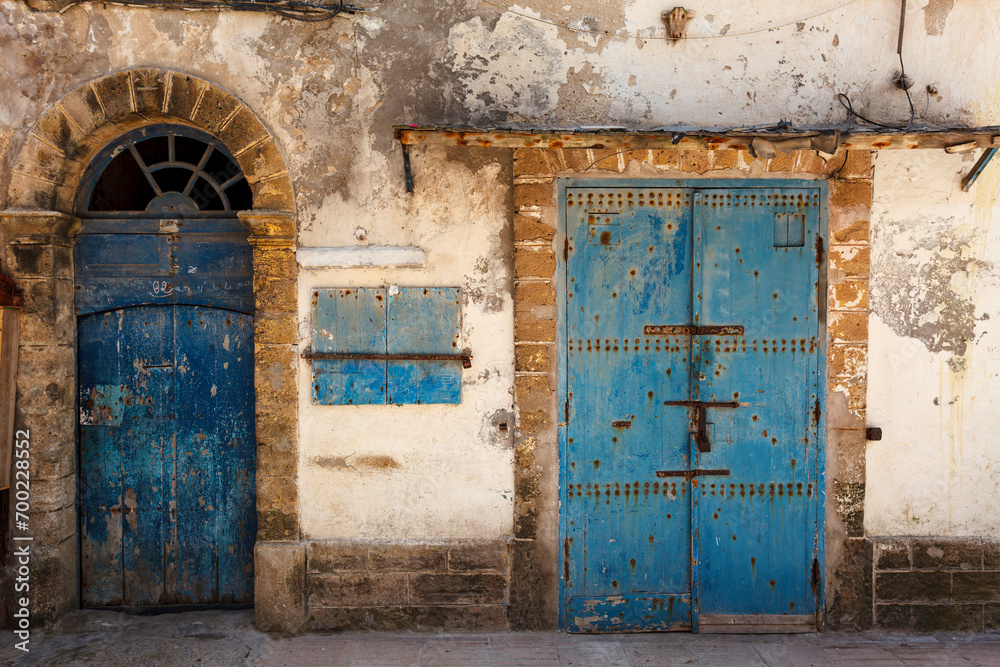 Old ornate blue door in the medina of Essaouira, Morocco, North Africa Old ornate blue door in the medina of Essaouira, Morocco, North Africa