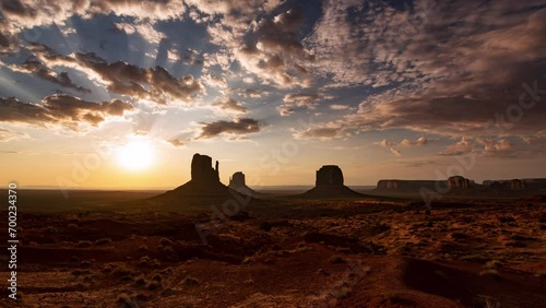 Monument Valley Sunrise View Wide Time Lapse Tilt Down Arizona Southwest USA photo