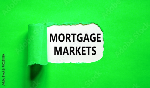 Mortgage markets symbol. Concept words Mortgage markets on beautiful white paper. Beautiful green paper background. Business mortgage markets concept. Copy space.