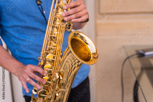 Photography Detail of hands of jazz musician playing saxophone, Jazz mood Concept