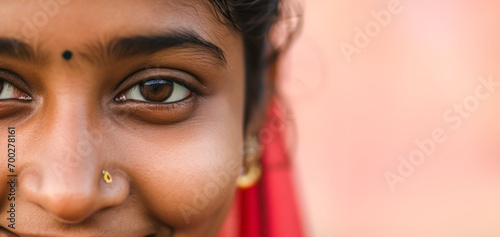 Close Up On Eyes Of Indian Young Woman Looking at Camera.