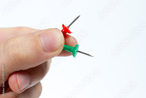 Push pin on white background