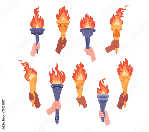Set of burning torches with flame in hands. Symbol of competition victory, champion. Vector illustration in flat style