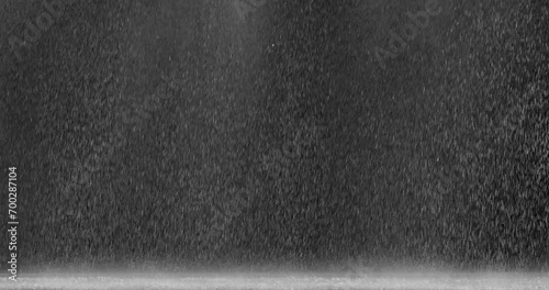Rain Wide 7 3721 2K Cinematic Realistic rainfall animation overlay background in alpha luma matte. Heavy rain storm seamless loop animation. Surreal raindrops falling thunderstorm overlay. Raindrops o photo