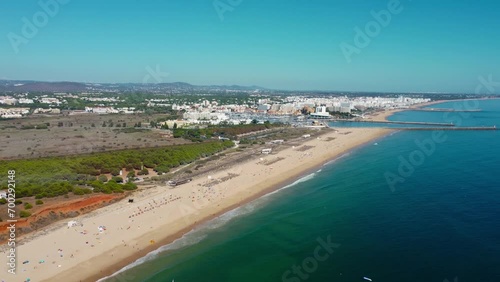 Aerial drone point of view of Falesia Beach. Situated in south of Portugal, Algarve region a famous travel destination. Golden mile beach. Beautiful panoramic view of all region.