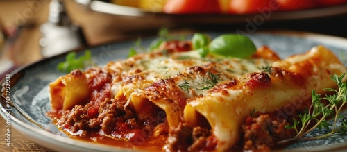 Cannelloni pasta filled with bolognese sauce and mozzarella.