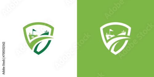 golf logo design with a combination of a shield and a golf playing field. golf safety logo photo
