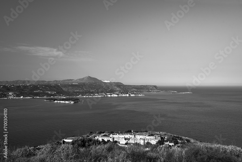 View of Souda Bay and the stone walls of the historic castle on the Greek island of Crete photo