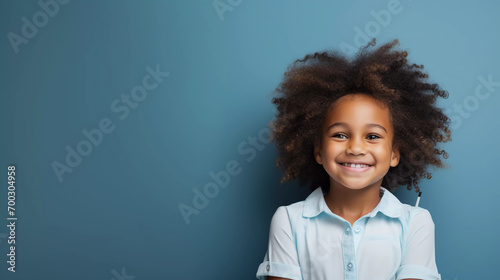Obraz na płótnie Smiling African American girl with shoulder patch post vaccination copy space