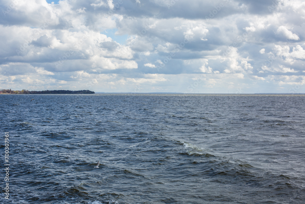 River bank in windy weather with waves