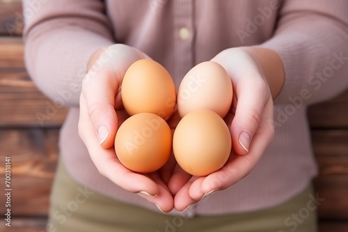 close-up shot capturing the essence of a woman farmer hands gently cradling chicken farm eggs. Farm fresh goodness. An intimate view showcasing the natural beauty of locally sourced eggs.
