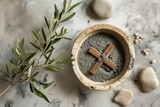 Christian cross and ash as symbol of religion, sacrifice, redemption of Jesus Christ. Ash Wednesday concept