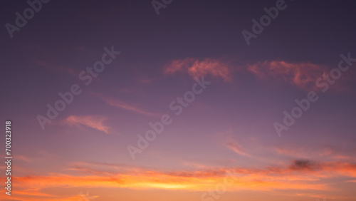 Sunset Sky Clouds in the Evening Light with Orange  Yellow and Purple Beautiful Nature Sunlight in  Golden Hour after Sundown Horizon Romantic Sky with Dusk Twilight in Summer Time
