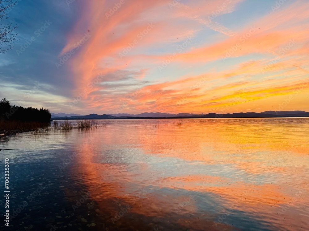 Colorful sunset on Lake Champlain, Vermont. 