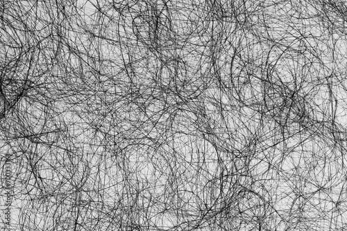 Threads of hair fibers in macro closeup in black on a white background