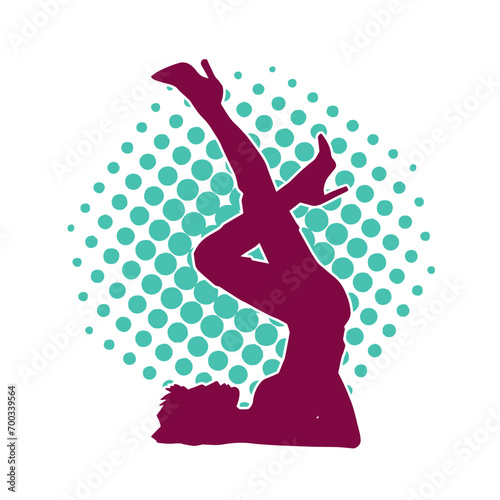 Silhouette of a sexy female doing seductive dance
