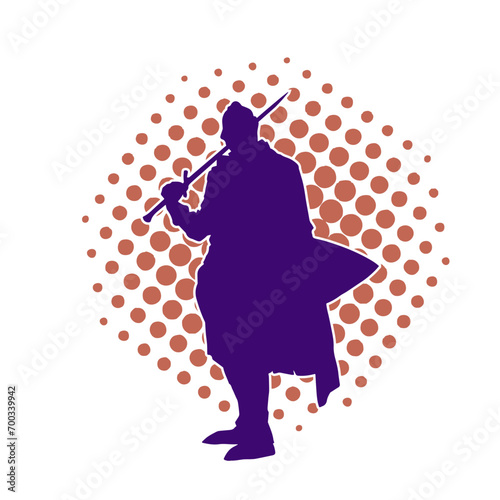Silhouette of a male warrior in action pose with sword weapon. Silhouette of a man fighter carrying sword weapon.