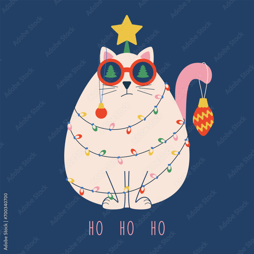 Φωτογραφία Christmas card with a funny cat wrapped in a garland and toys with a star on its head and text ho ho ho