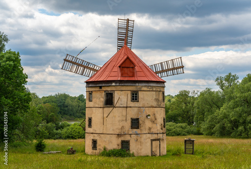 Historical windmill Svetlik from 1843 in the village of Horni Podluzi, Usti nad Labem region, listed as cultural monument of Czech Republic photo