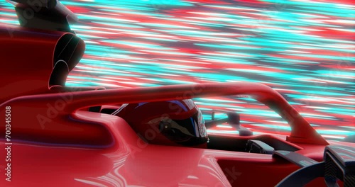 Close-up of racing car pilot while driving at high speed photo