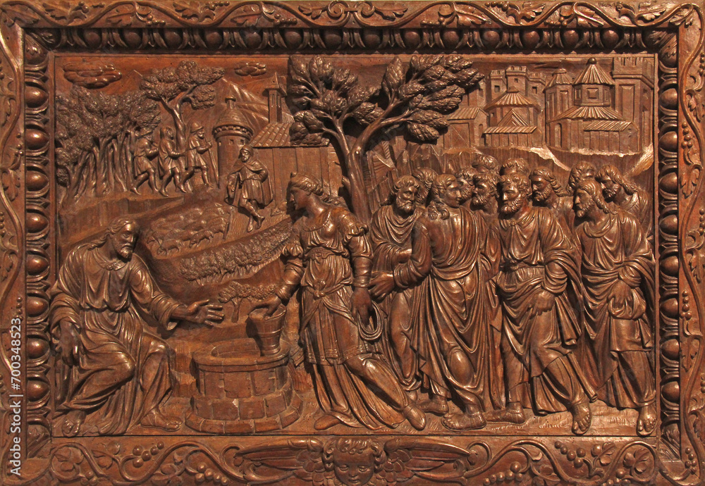 Gesù e la Samaritana; rilievo in legno conservato nel complesso monumentale di Santa Croce a Bosco Marengo (Alessandria)