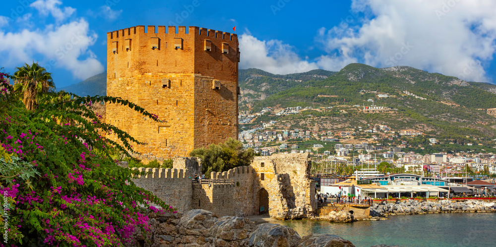 Wall Mural Ancient Red Tower Kizil Kule in port of Alanya, Turkey
