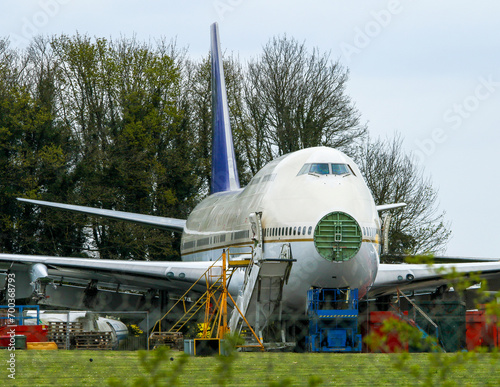 large airplane in the airport scrap yard photo