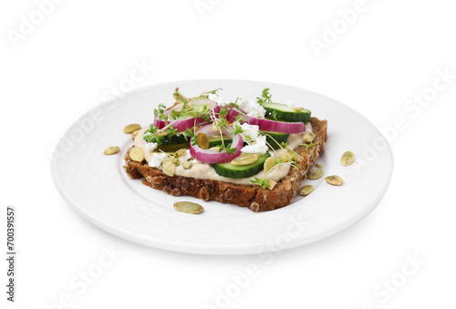 Tasty vegan sandwich with cucumber, onion, hummus and pumpkin seeds isolated on white