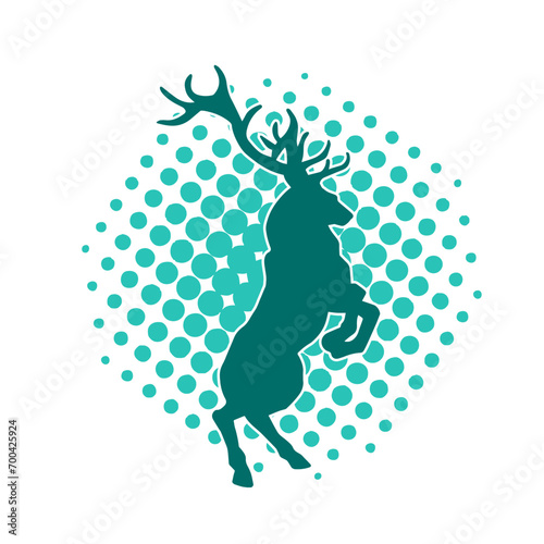Silhouette of a wild deer forest animal with beautiful antlers.  photo