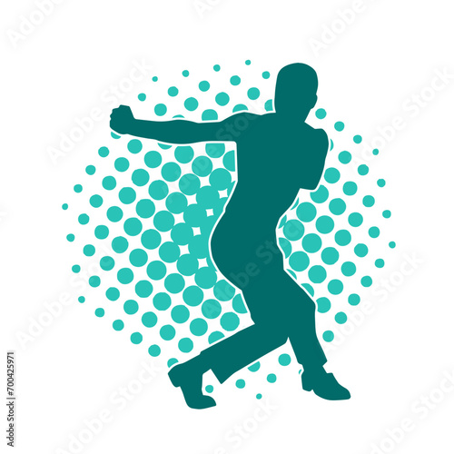 Silhouette of a man in oriental martial art pose. Silhouette of a male in martial art move.