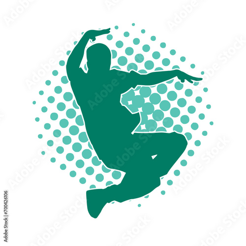 Silhouette of a slim man dancing pose. Silhouette of a male dancer in action pose.