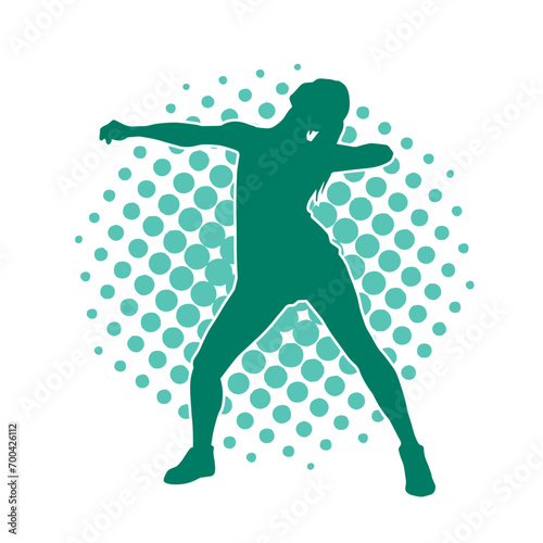 Silhouette of a casual female in a dancing pose. Silhouette of a dancer woman in action pose.