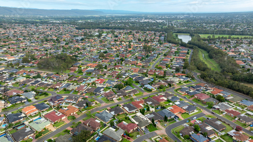Drone aerial photograph of residential houses and recreational spaces in the suburb of Glenmore Park in the greater Sydney region in New South Wales in Australia photo