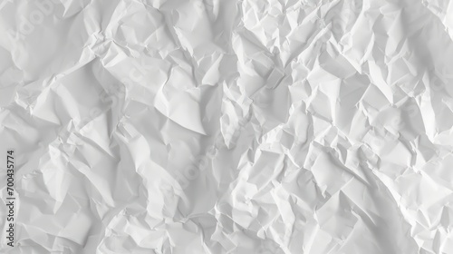 White crumpled paper background texture pattern. Tileable wrinkled high-resolution arts and crafts flat lay backdrop