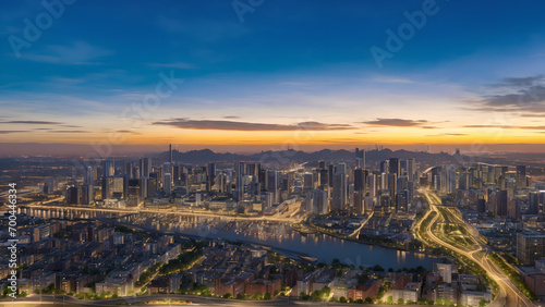 view of the city at sunset © Wang