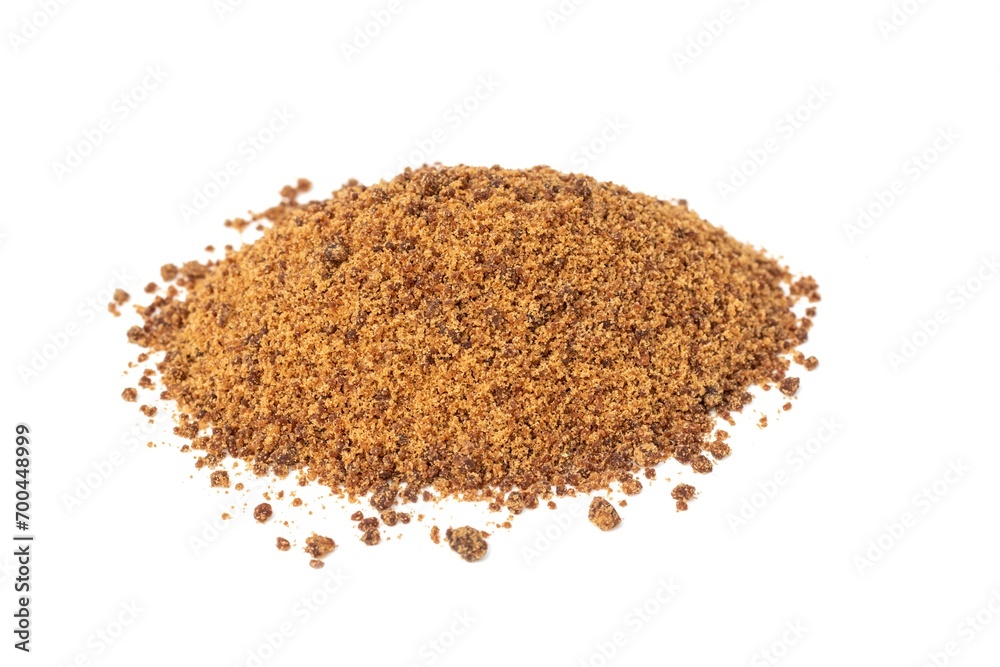 Granulated Sugarcane Jaggery or Indian Gur Isolated on White Background with Copy Space Granulated Sugarcane Jaggery or Indian Gur Isolated on White Background with Copy Space